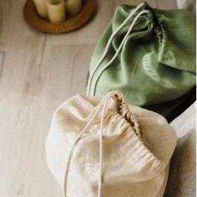 Beige laundry bag with drawstring